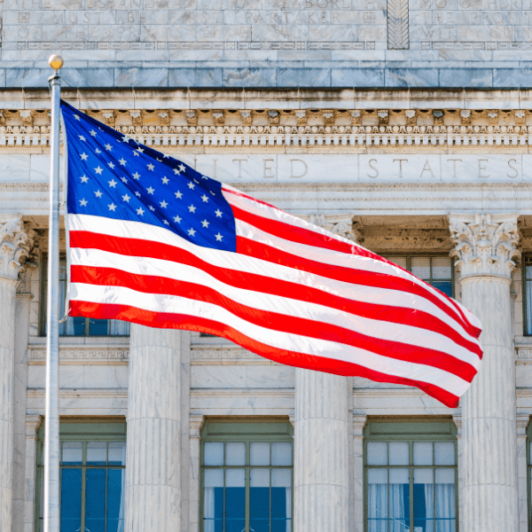 National flag of the USA, in front of US Department of Agriculture in Washington D.C.