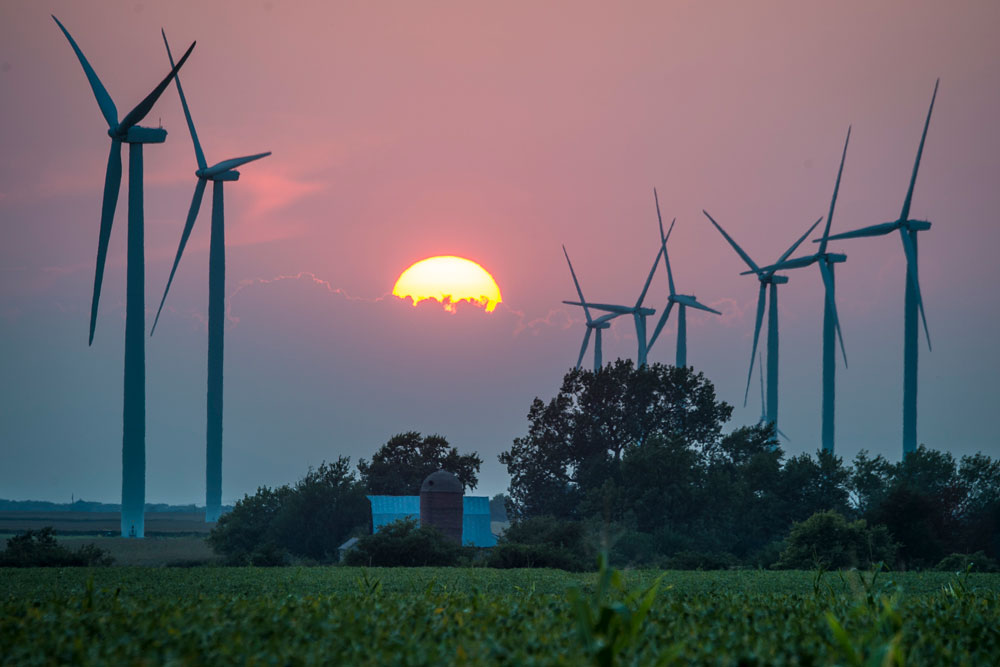 The sunset around wind turbines
