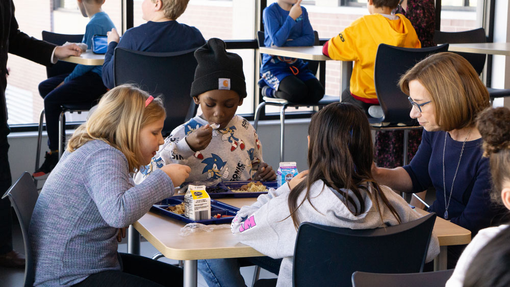 USDA Food and Nutrition Service Administrator Cindy Long eats a nutritious and delicious school lunch with students from Granite Ridge School in Cottage Grove, Wisconsin