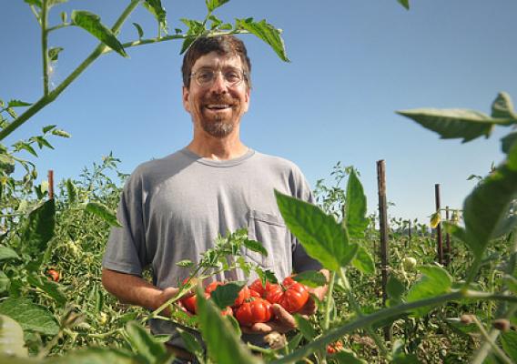 Oregon Farmer Chris Roehm with tomatoes