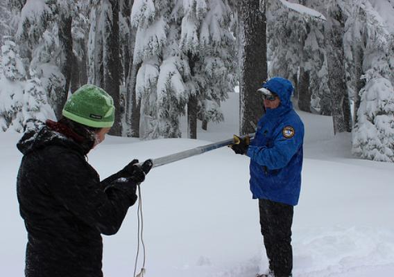 Hydrologists prepare to measure snowpack. (NRCS photo)