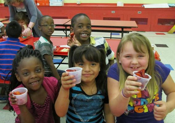 Dunbar Elementary School students enjoying fresh, local strawberries during Delaware's Strawberry week.