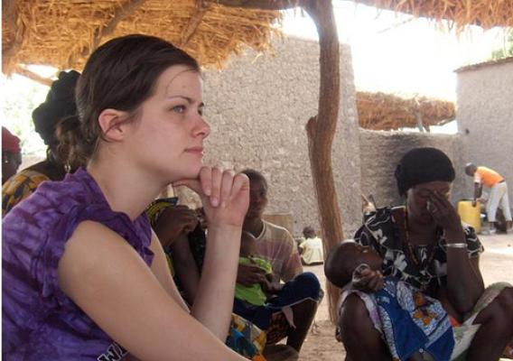 Former Montana State University student Ashley Williams meets with residents of Sanambele, Mali, to discuss water quality issues affecting the community.