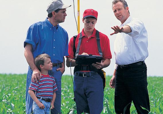 As well as helping them market and process their crops, co-ops also help farmers obtain farm supplies and provide them with important agronomy services, such as mapping their fields to ensure they use only the proper amounts of fertilizer, thus avoiding runoff problems.  Photo courtesy GROWMARK