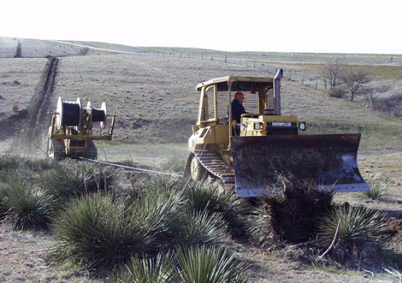 Plowing fiber optic cable in Northwest Kansas. (Photo courtesy of Rural Telephone)