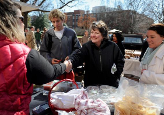 Agriculture Deputy Secretary Dr. Kathleen Merrigan meets with local producers at the North Carolina University's student run Farmer's Market in Raleigh, NC, on Feb. 9, 2011.