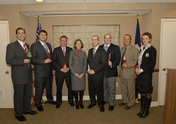 Farm and Foreign Agricultural Services Deputy Under Secretary Darci Vetter joined seven FAS Foreign Service Officers on Feb. 22  for a swearing-in ceremony at USDA. Pictured (L-R) are Caleb O’Kray (Brazil); Jess Paulson (Turkey); Mariano Beillard (Egypt); D U/S Vetter; Mark Myers (Korea); Christopher Riker (Russia); William Verzani (Philippines) and Emily Scott (Taiwan). 