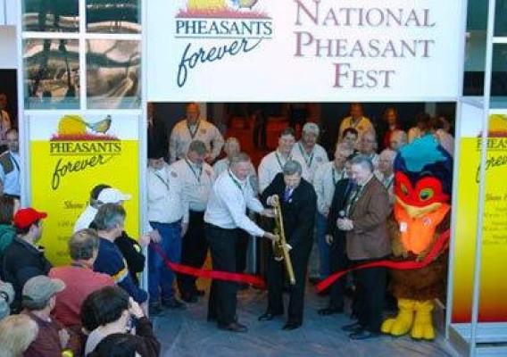 Agriculture Secretary Tom Vilsack traveled to Nebraska last week. He addressed students and Ag leaders.  Here the Secretary cuts ribbon at open of 2011 Pheasant Fest in Omaha.  
