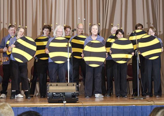 Class of 2010 graduates sing a sweet tune welcoming our “new-bees” as Executive Master Gardeners