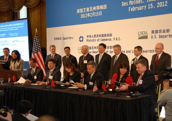 At a Feb. 15 ceremony in Des Moines, Chinese buyers agreed to purchase more than 8.6 million metric tons of U.S. soybeans. Standing, from left, are: Iowa Soybean Association CEO Kirk Leeds, CFNA Deputy Director Chen Ying, U.S. Soybean Export Council CEO Jim Sutter, CFNA President Bian Zhenu, USDA Acting Under Secretary for Farm and Foreign Agricultural Services Michael Scuse, China’s Assistant Minister of Commerce Yu Jianhua, Iowa Secretary of Agriculture Bill Northey, American Soybean Association President