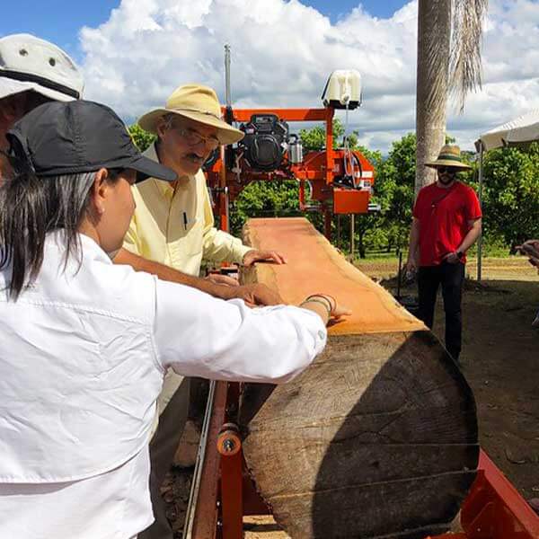 John Curtis, contract instructor, demonstrates milling techniques at a workshop sponsored by USDA’s Caribbean Climate Hub.