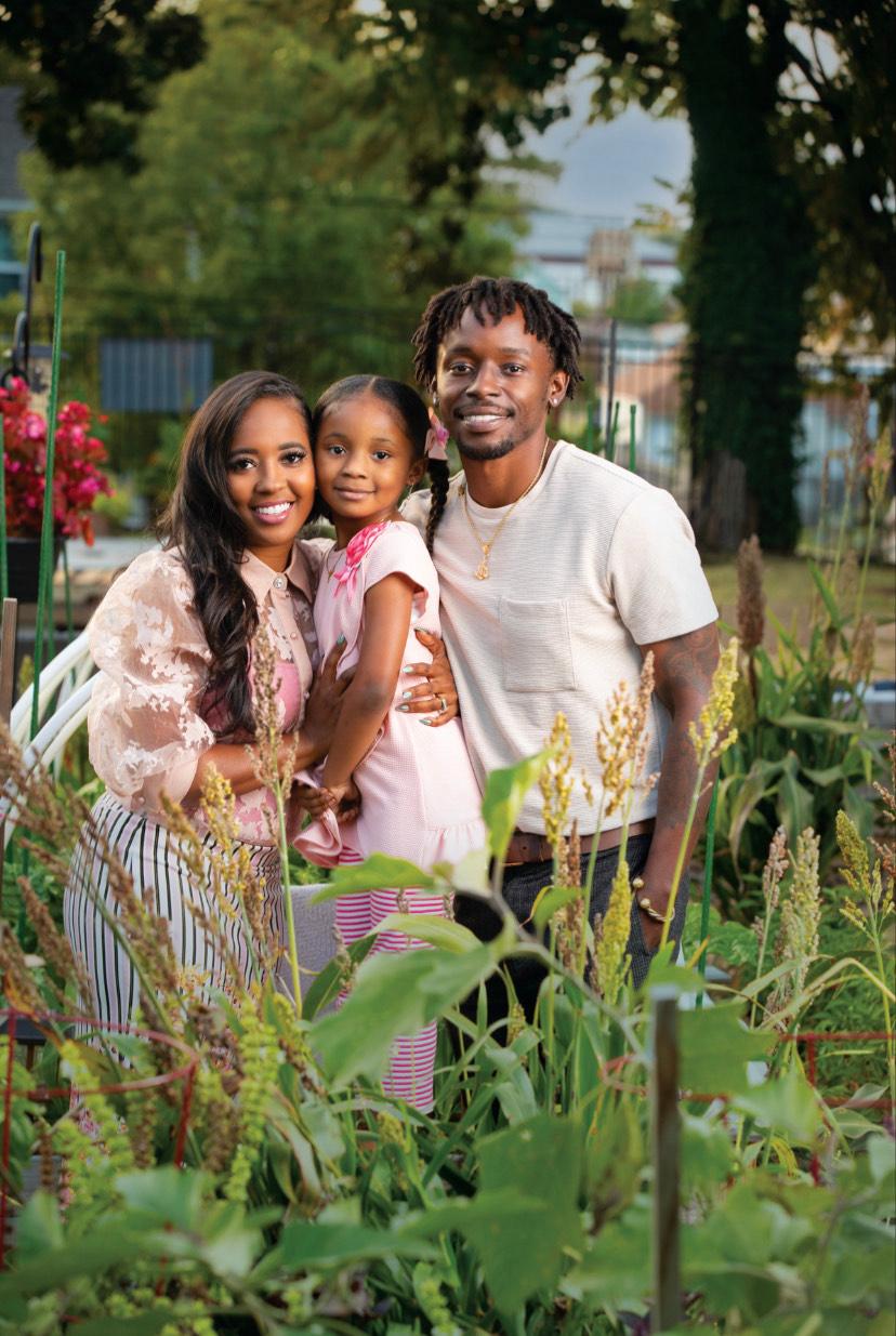 Bobby and Derravia Rich with their daughter at Black Seeds Urban Farm