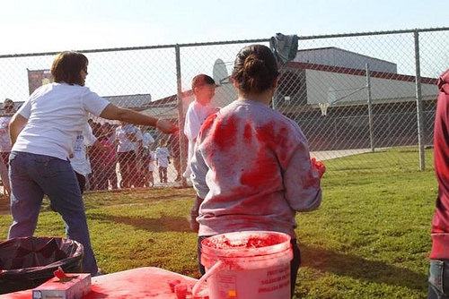 Participants with colored corn starch on shirts
