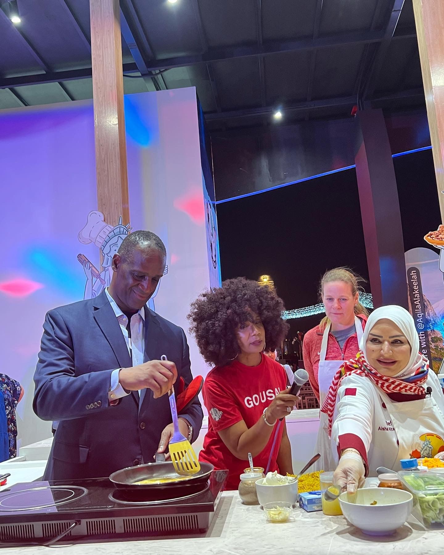 (Pictured left to right) U.S. Ambassador to Qatar Timmy Davis, USDA Agricultural Counselor Valerie Brown, and U.S. Soccer President Cindy Parlow Cone join Qatari Celebrity Chef Aisha Al Tamimi at the USA Pavilion