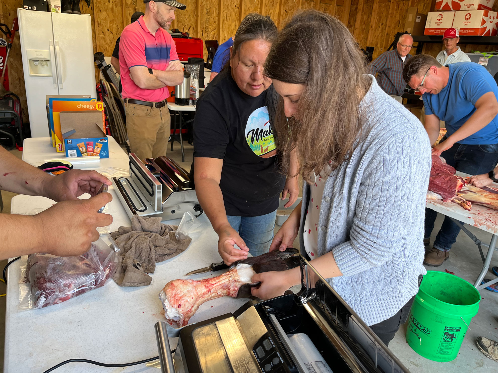FNS Senior Policy Advisor Ali Hard participated in a traditional buffalo harvest with members of the Oglala Sioux tribe, FNS Mountain Plains Region staff, and staff from the USDA Food Safety and Inspection Service