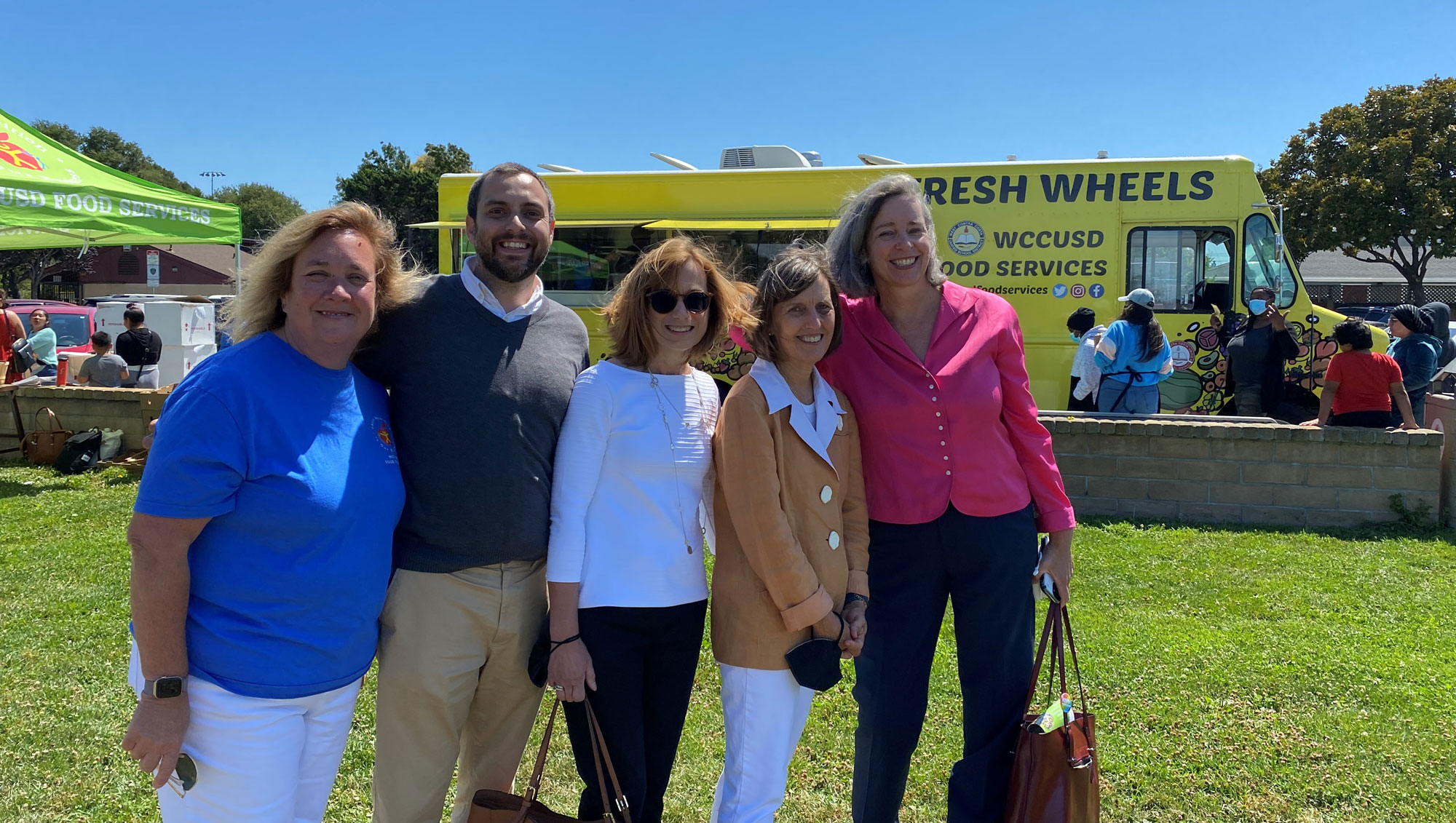 FNSC Deputy Under Secretary Stacy Dean, California Department of Education Child Nutrition Program Director Kim Frinzell, FNS Administrator Cindy Long, California Department of Food & Agriculture Office of Farm to Fork Nick Anicich and West Contra Costa Unified School District Food Service Director Barbara Jellison visit Davis Park in front of the WCCUSD ‘Fresh Wheels’ mobile kitchen