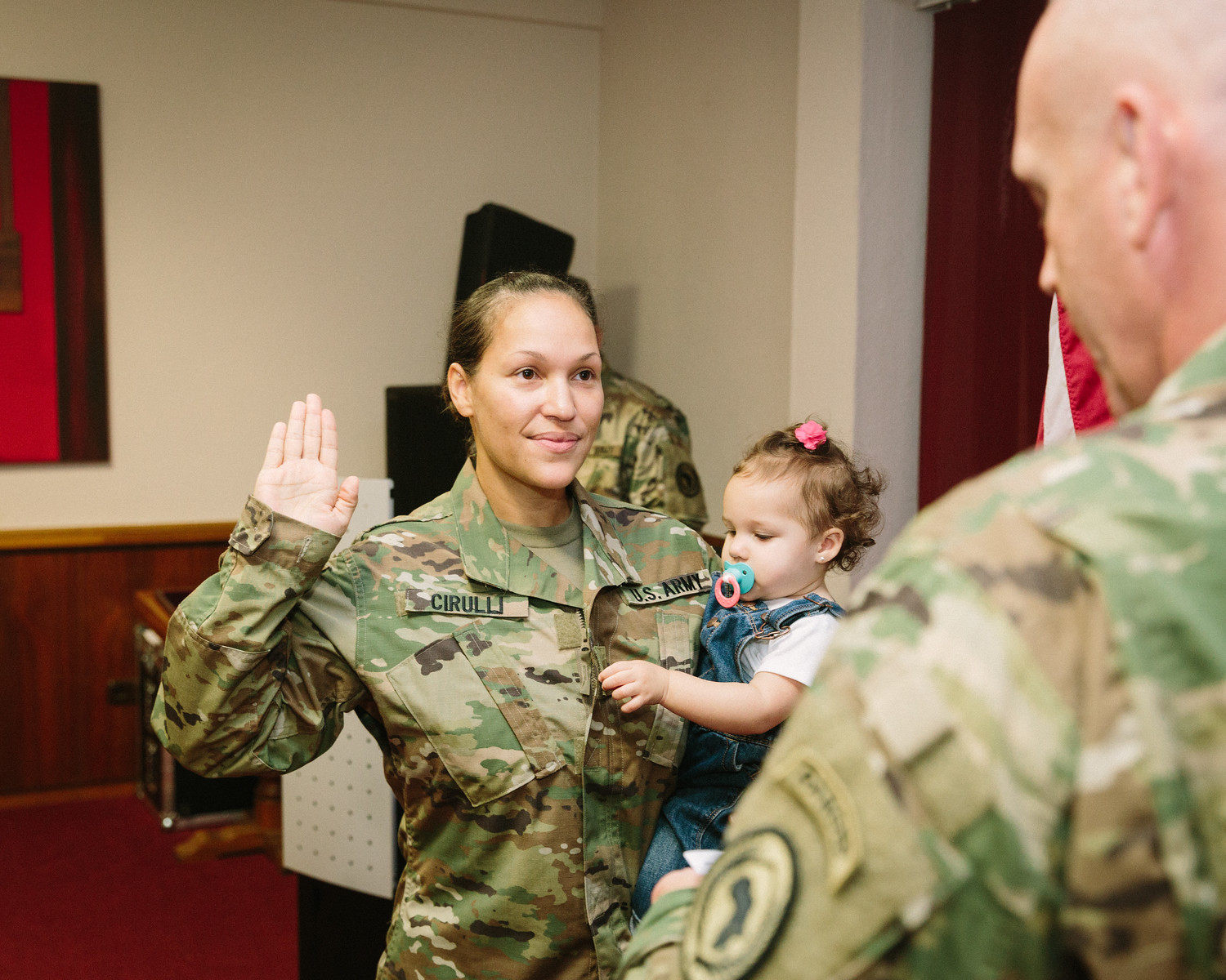 Gloria Cirulli with daughter swearing in