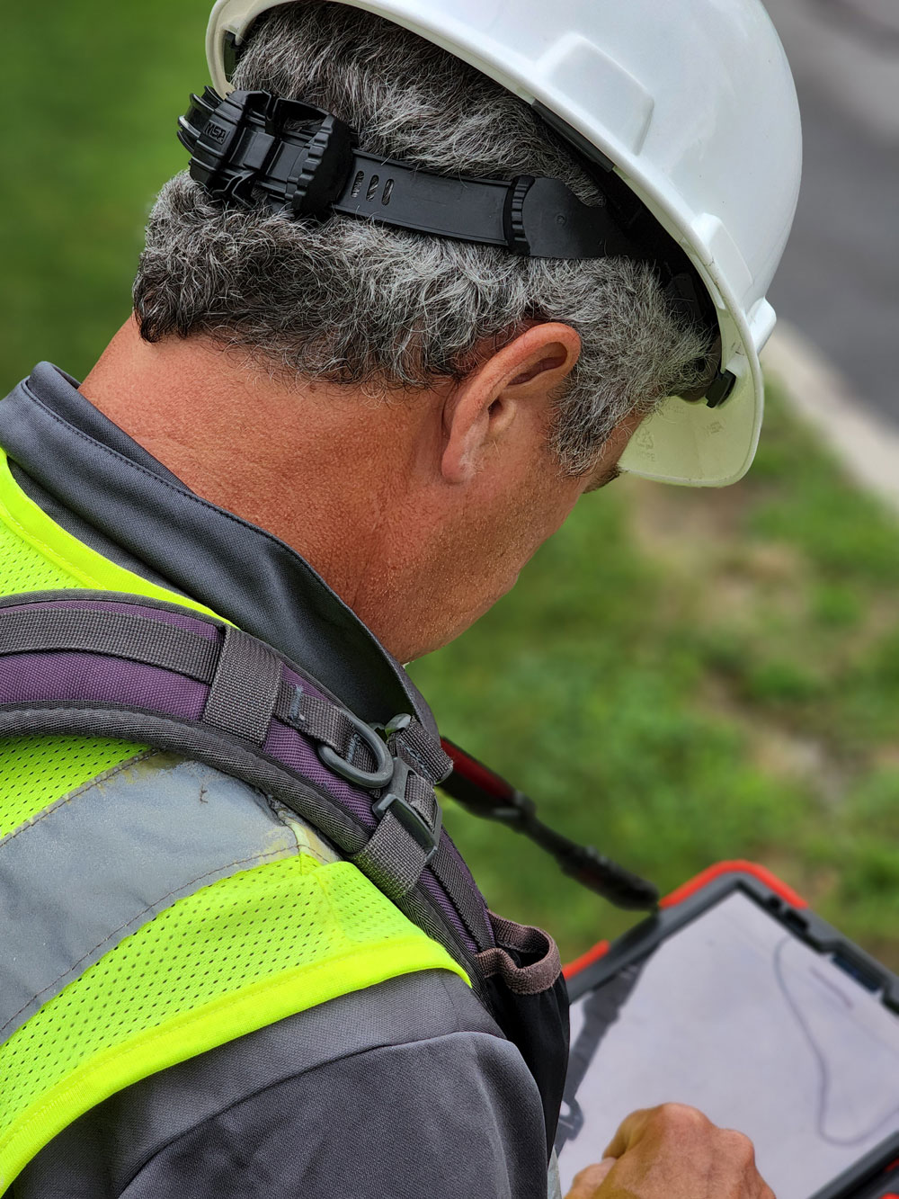 A project engineer inputs data as work progresses on Madison County’s USDA ReConnect project in Wampsville, NY