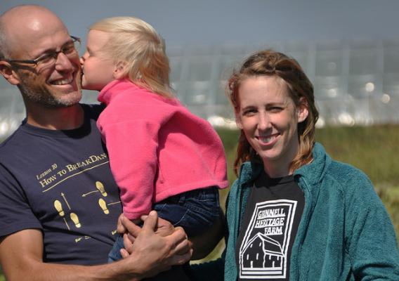 Grinnell Heritage Farm owners Andy and Melissa Dunham with daughter Leonora, own and operate a certified organic farm in Grinnell, IA.
