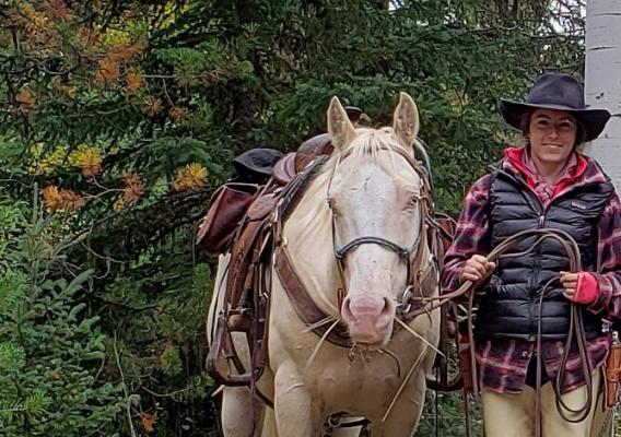 Jessianne Castle of USDA APHIS Wildlife Services with her horse, Thyme