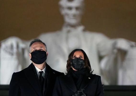 U.S. Vice-President Kamala Harris and her husband Doug Emhoff attend a televised ceremony at the Lincoln Memorial