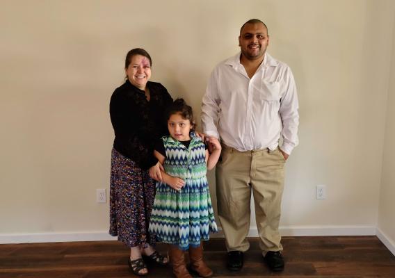 Gloria Gonzalez, Francisco Sanchez, and their daughter enjoy getting settled into their new home in Loudon County, Tennessee