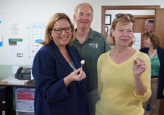 USDA Under Secretary Jenny Lester Moffitt and U.S. Senator Tammy Baldwin sampling the cheese at Crave Brothers Farmstead Cheese, with owner George Crave in Waterloo, Wisconsin