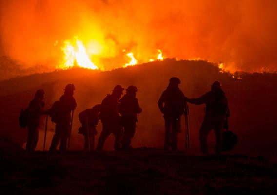 Firefighters serve long hours in arduous conditions as illustrated in this picture from the Thomas Fire in Ventura, California on the Los Padres National Forest in 2017 (Forest Service photo by Kari Greer)