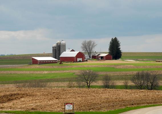 A family farm sits on small knoll in La Crosse, Wisconsin
