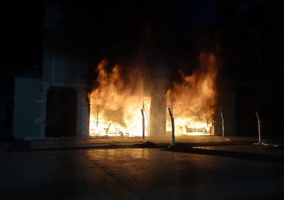 The fully engulfed cross-laminated building during test one