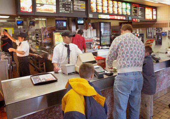 People eating out at a fast food restaurant