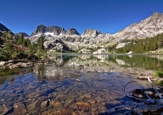 A lake lying below the Minarets in the Ansel Adam Wilderness Inyo National Forest