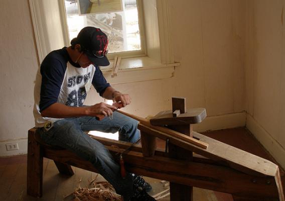 Traditional Building Skill in Action: Gage Olson uses traditional woodworking tools. 