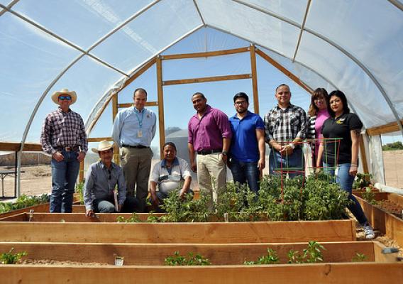 NRCS staff with Tribal Council members Javier Loera and Michael Silvas in a high tunnel