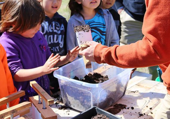 Students working with plants at Red Cloud Indian School in Pine Ridge, South Dakota