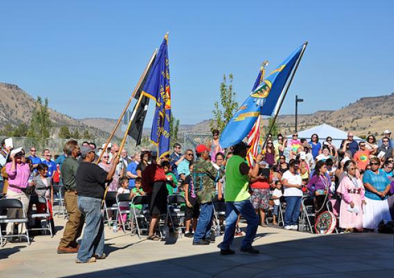 Tribal and community leaders on the Confederated Tribes of the Warm Springs Indian Reservation of Oregon to celebrate the completion of their new K-8 school.