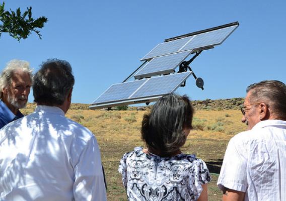 Mark Snyder, Tony Hernandez and the Schulers check out the solar array.
