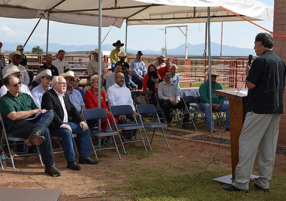 USDA Marketing and Regulatory Programs Under Secretary Ed Avalos speaking to Congressman Ron Barber and local stakeholders at the celebration of the opening of the contingency livestock inspection facility in Douglas, AZ.