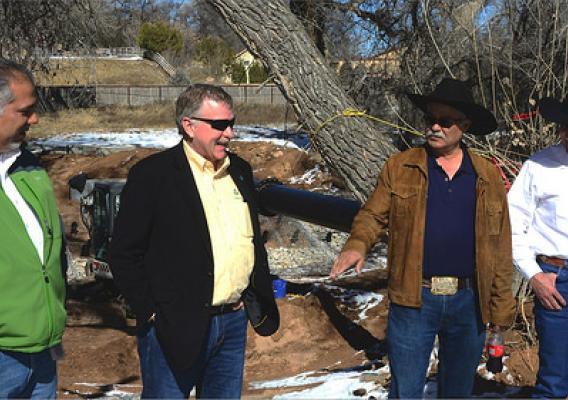 Xavier Montoya, State Conservationist for NRCS New Mexico (left) and Mark Rose (center left), NRCS director of financial assistance programs manager, Kenneth Salazar (center right) and others