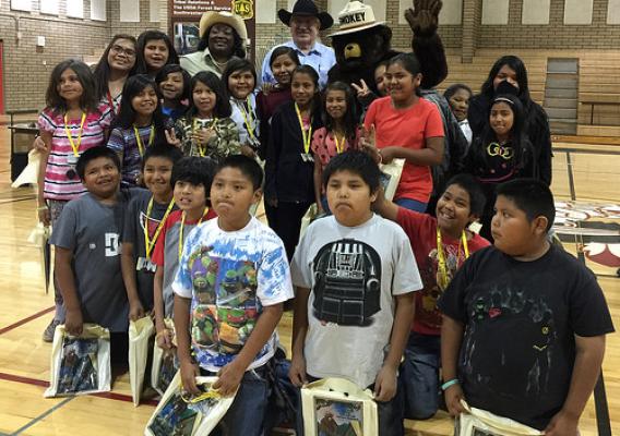 USDA Deputy Under Secretary Arthur “Butch” Blazer with a group of San Carlos Apache Reservation fourth graders