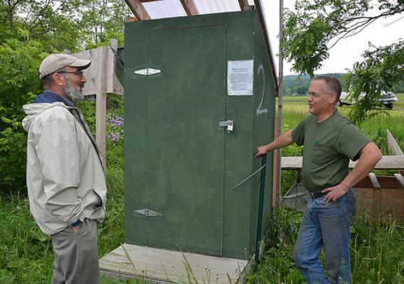 NRCS Soil Conservationist Danny Peet, left, with Vermont farmer Lorenzo Whitcomb