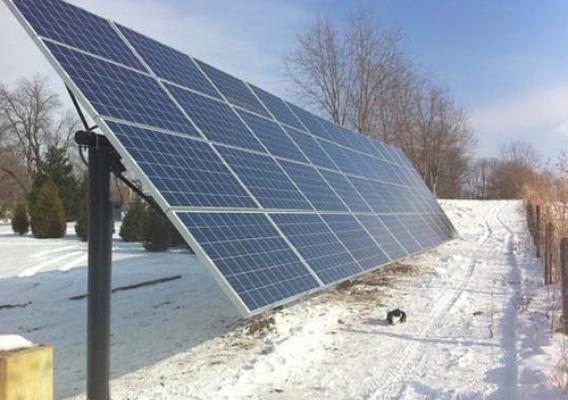  This solar module, funded in part through USDA’s Rural Energy for America Program,  is oriented to the south on a ground-mounted rack near a rural  business in Tippecanoe County, Indiana.   
