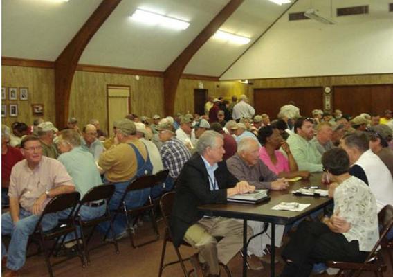 Residents of Marvell, Arkansas, meet to hear remarks by USDA Undersecretary Dallas Tonsager.  Tonsager discussed programs available through USDA to help victims of flooding and other disasters.