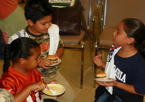 Local San Juan area children sample the nutritious meals that will be distributed to more than 1,500 children at feeding sites this summer.