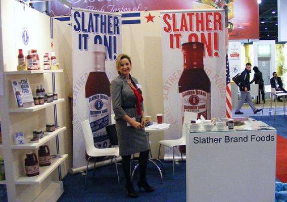 Robin Rhea, owner of Slather Brand Foods, Inc., is pictured here during the International Food Exhibition (IFE) in London.