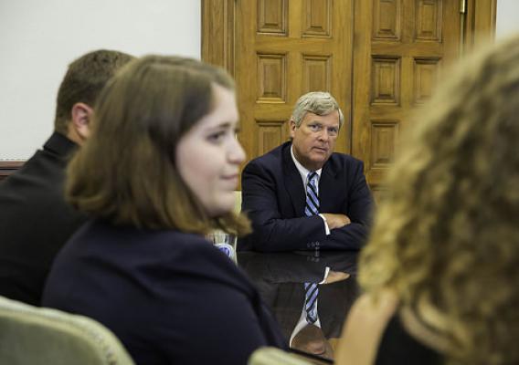 Agriculture Secretary Tom Vilsack talks to winners of the 1st International Soil Judging Contest during their visit to USDA on Aug. 18. American college students took the top two places in the first ever international competition.