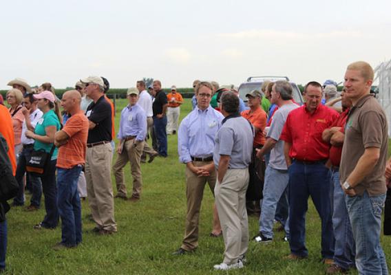 NRCS Chief Weller talks with partners, conservation agencies and landowners during a conservation tour in Illinois.