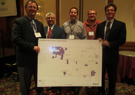 David Villano (far right) Asst. Administrator, USDA Utilities Programs,  is pictured with representatives of three Kansas Recovery Act Broadband Awardees including SC Telcom, Nex-Tech and Madison Telephone as well as the Vice Chair of the Governor’s Broadband Advisory Board.  