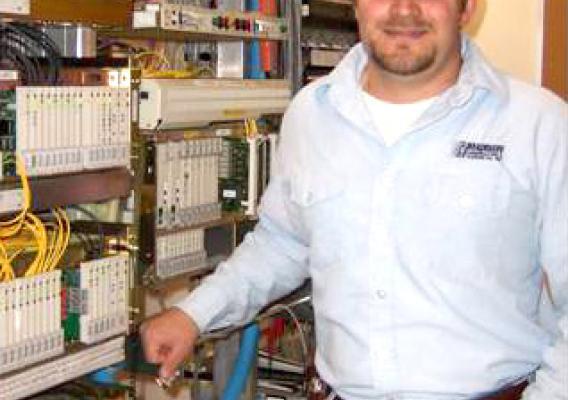 Rob McDonald, central office technician with Madison Telephone LLC, is responsible for the inside switching equipment, wiring, and maintenance for the Broadband system. (Photo courtesy of Mary Meyer, CEO Madison Telephone)
