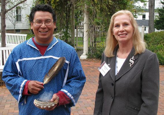 Aroostook Band of Micmacs Cultural Director John Dennis performed a smudging ceremony for attendees at the Tribal Consultation. In the photo are John Dennis and USDA Rural Development State Director Virginia Manuel